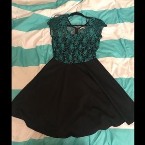 Lace teal and black dress.